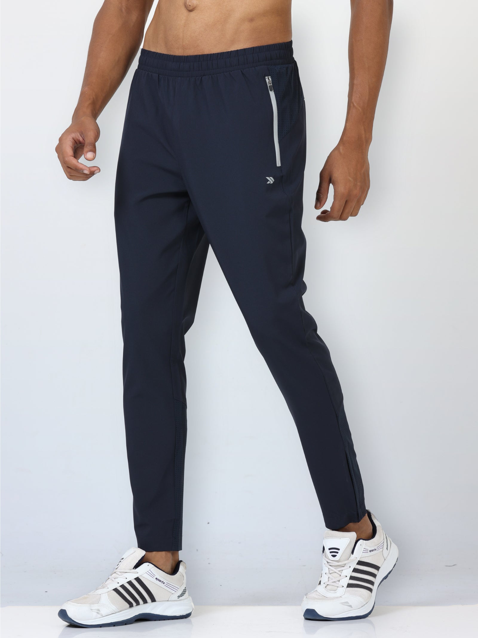 Buy online Men White Solid Regular Fit Track Pants from Sports Wear for Men  by Moonaah for ₹959 at 63% off | 2024 Limeroad.com
