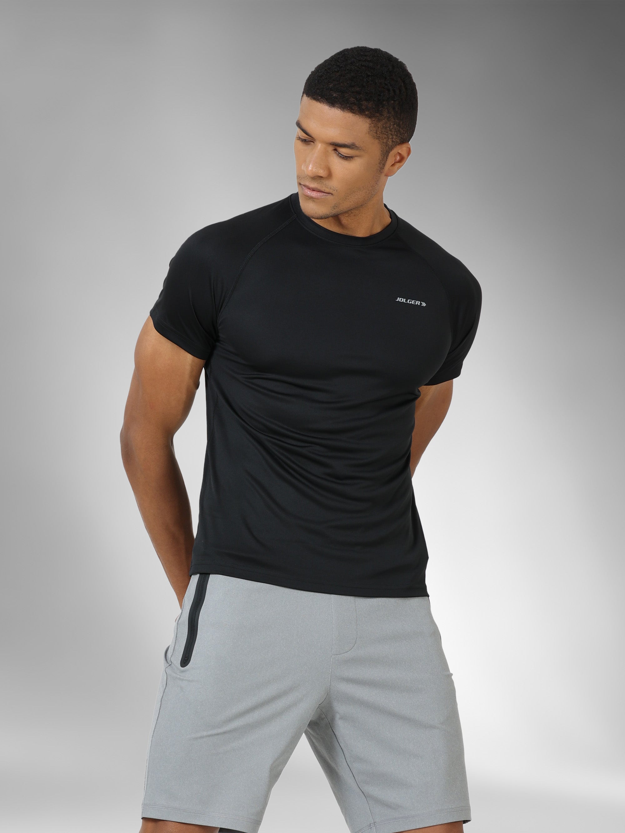 JAMTS009A_black_leftpose_roundnecktee